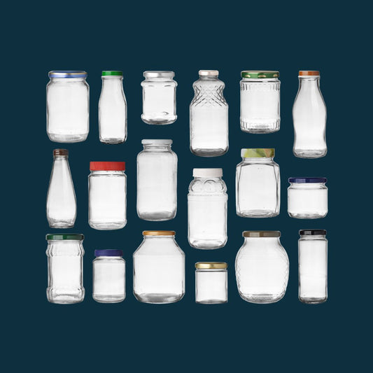 Glass jars laid out on turquoise background