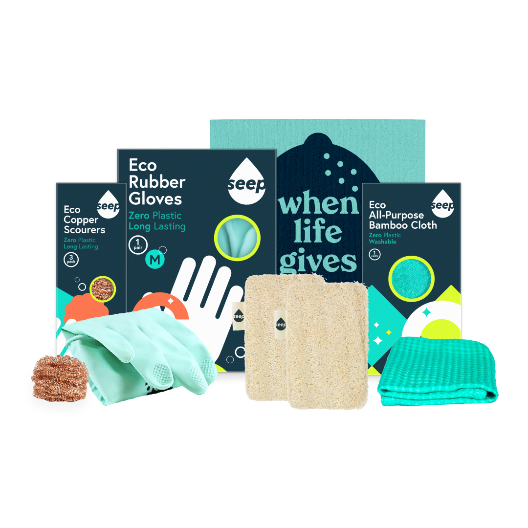 A bundle of eco cleaning tools, including copper scourers, rubber gloves, a sponge cloth, a bamboo cloth and sponge scourers