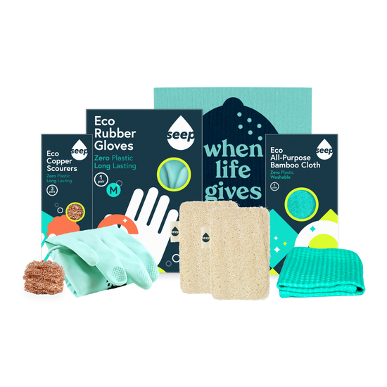 A bundle of eco cleaning tools, including copper scourers, rubber gloves, a sponge cloth, a bamboo cloth and sponge scourers