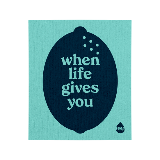 Turquoise swedish cloth with a navy 
lemon and "when life gives you" print