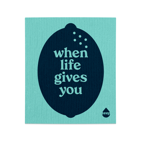 Turquoise swedish cloth with a navy 
lemon and "when life gives you" print
